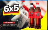 Oferta de Gaseosas Coca cola x 500cc en Carrefour Maxi